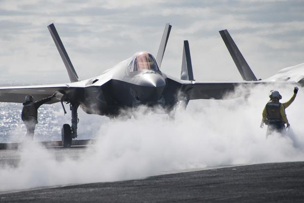 An F-35C performs flight operations aboard the USS Carl Vinson.